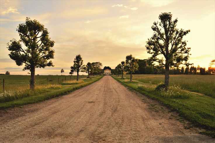 clouds country countryside dirt road