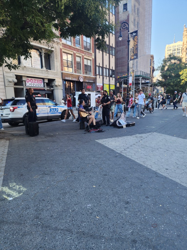 Cops hassling a musician in New York